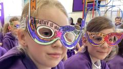 Children wearing empathy specs
