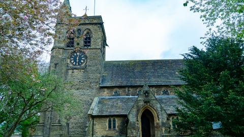 Exterior picture of the church tower taken from the grounds
