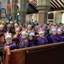 Children in Church wearing crowns